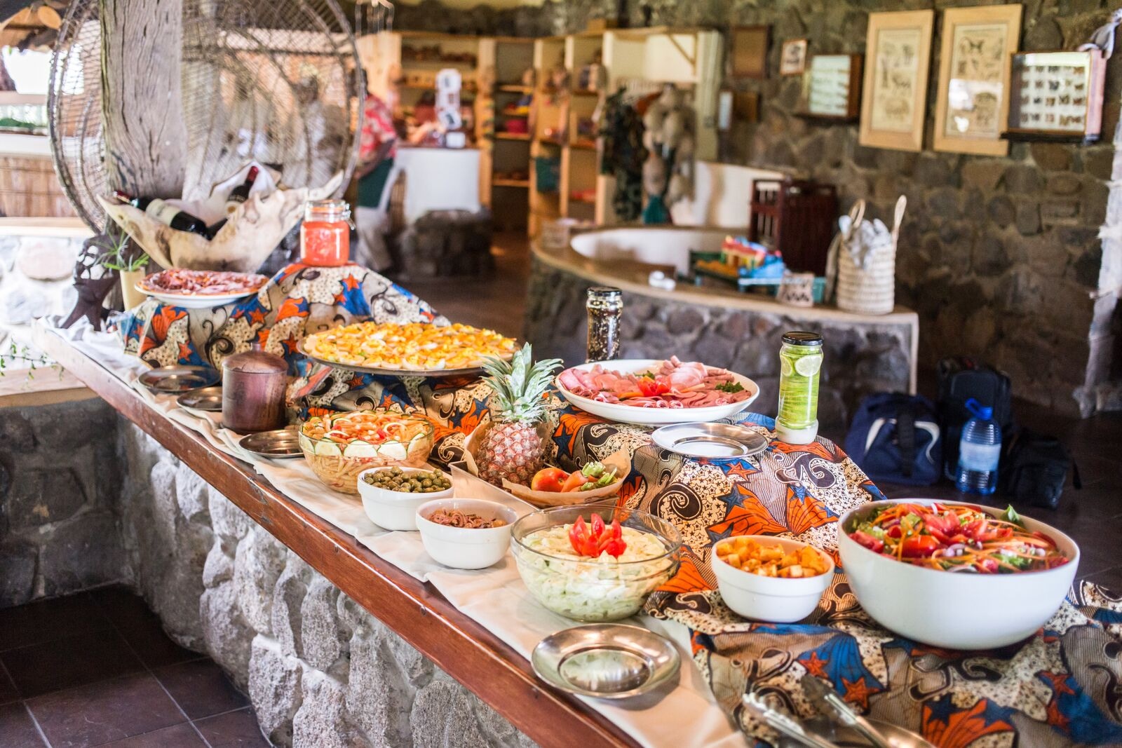 A buffet of fresh dishes laid out at Mvuu Camp.