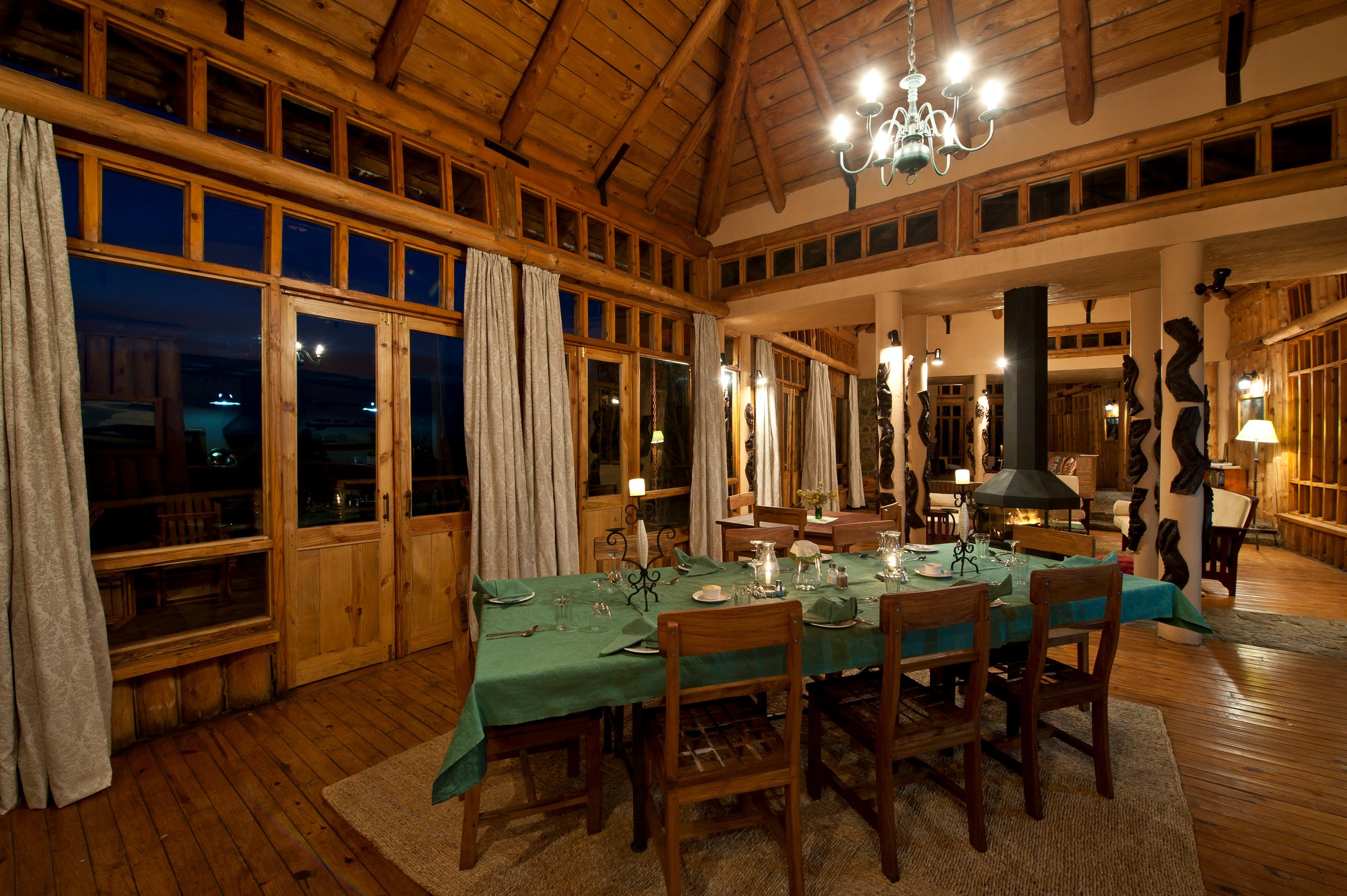 Chelinda Lodge dining room in the evening.