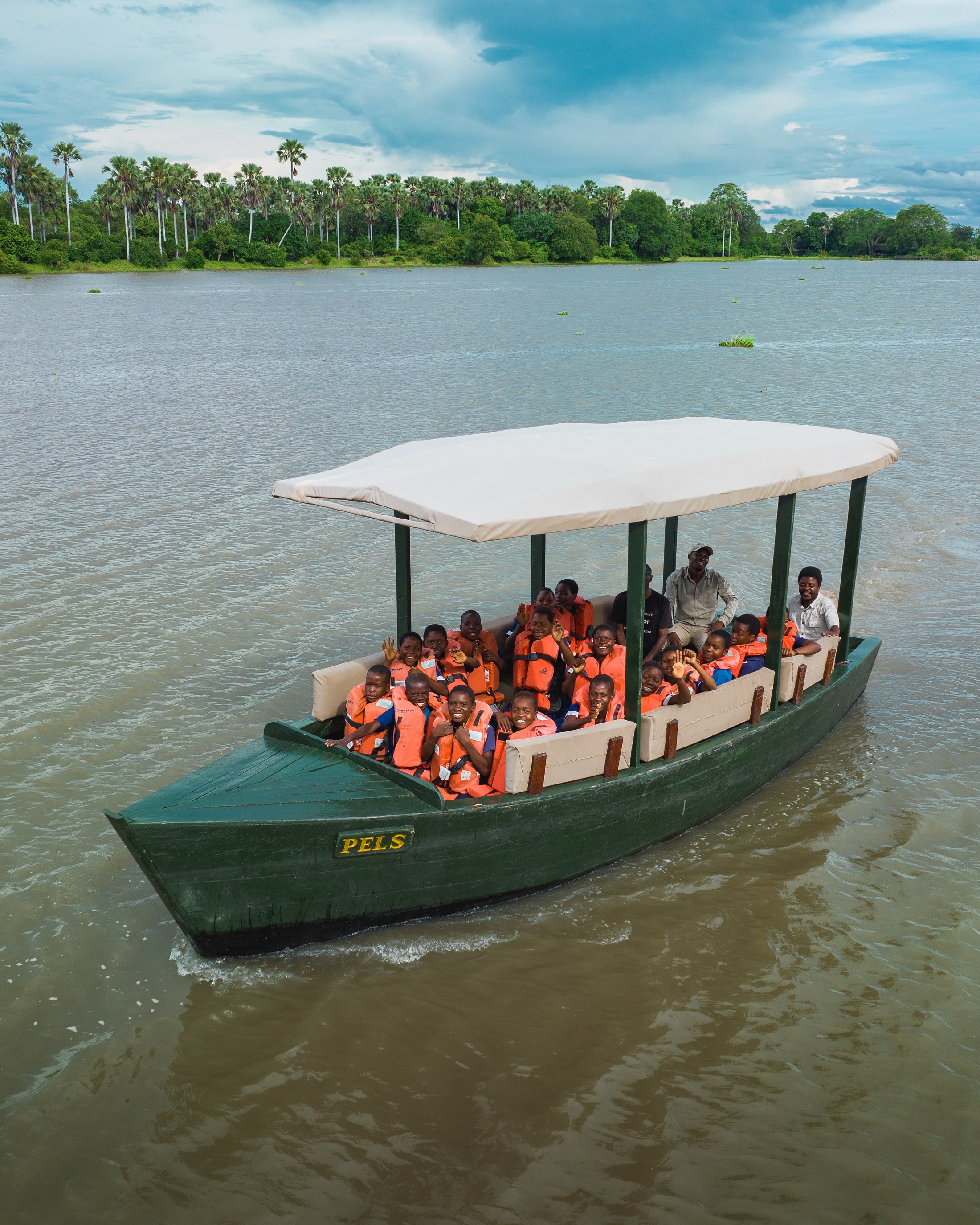 Children in the Wilderness participants on a boat safari.