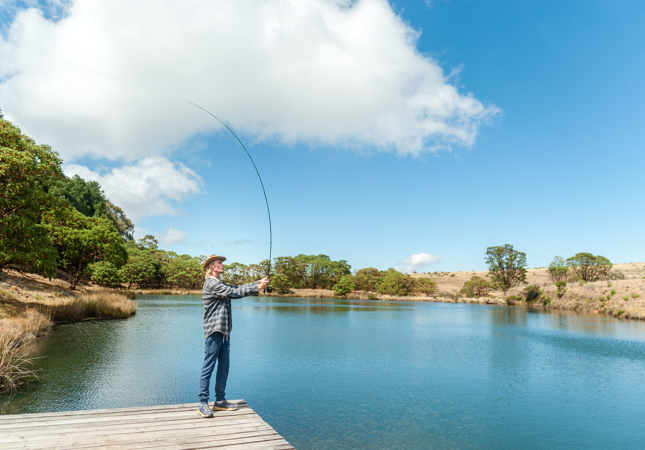 Fly fishing beside the water at Chelinda.