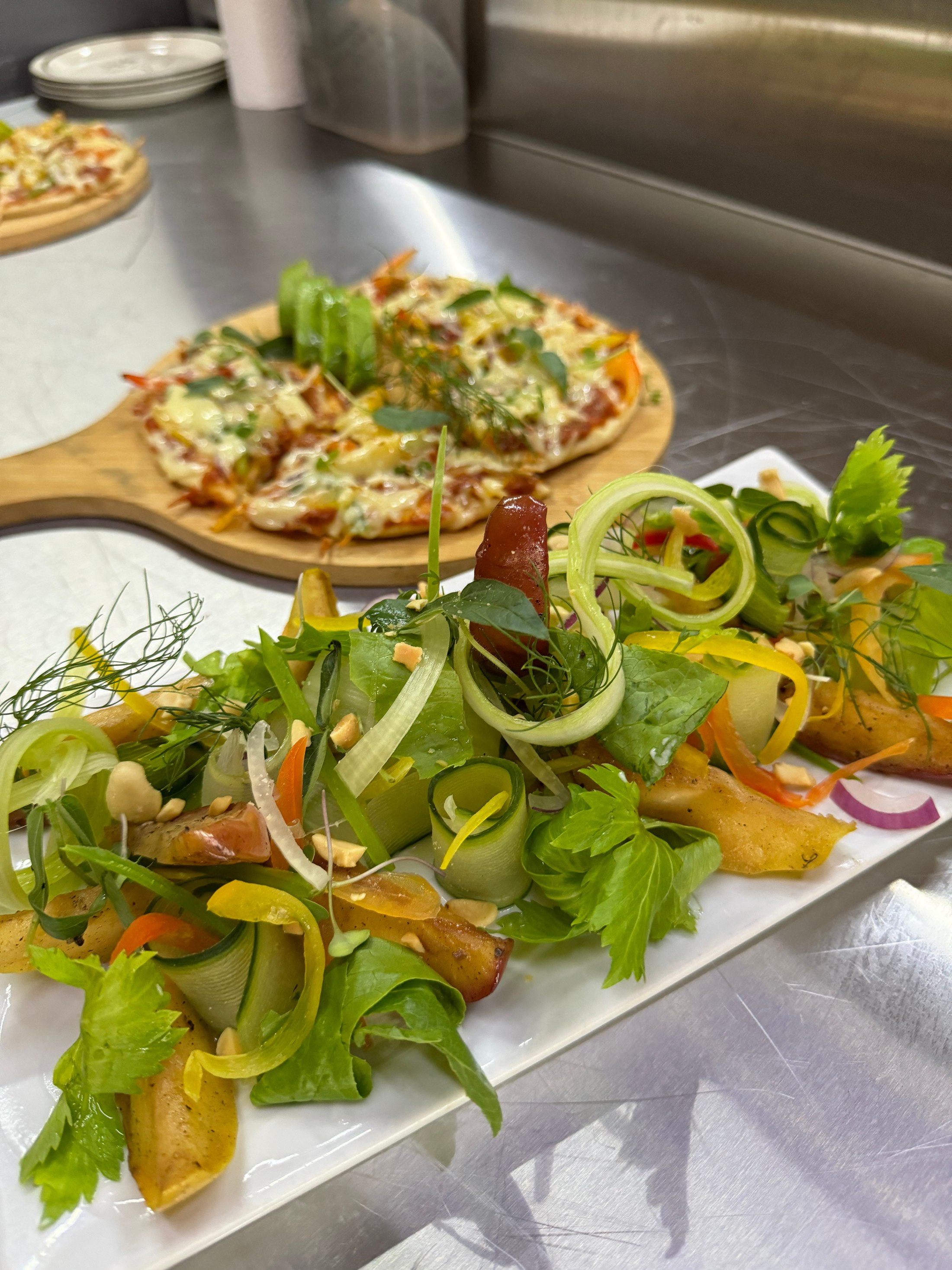 Fresh salad and pizza at Mvuu Lodge.