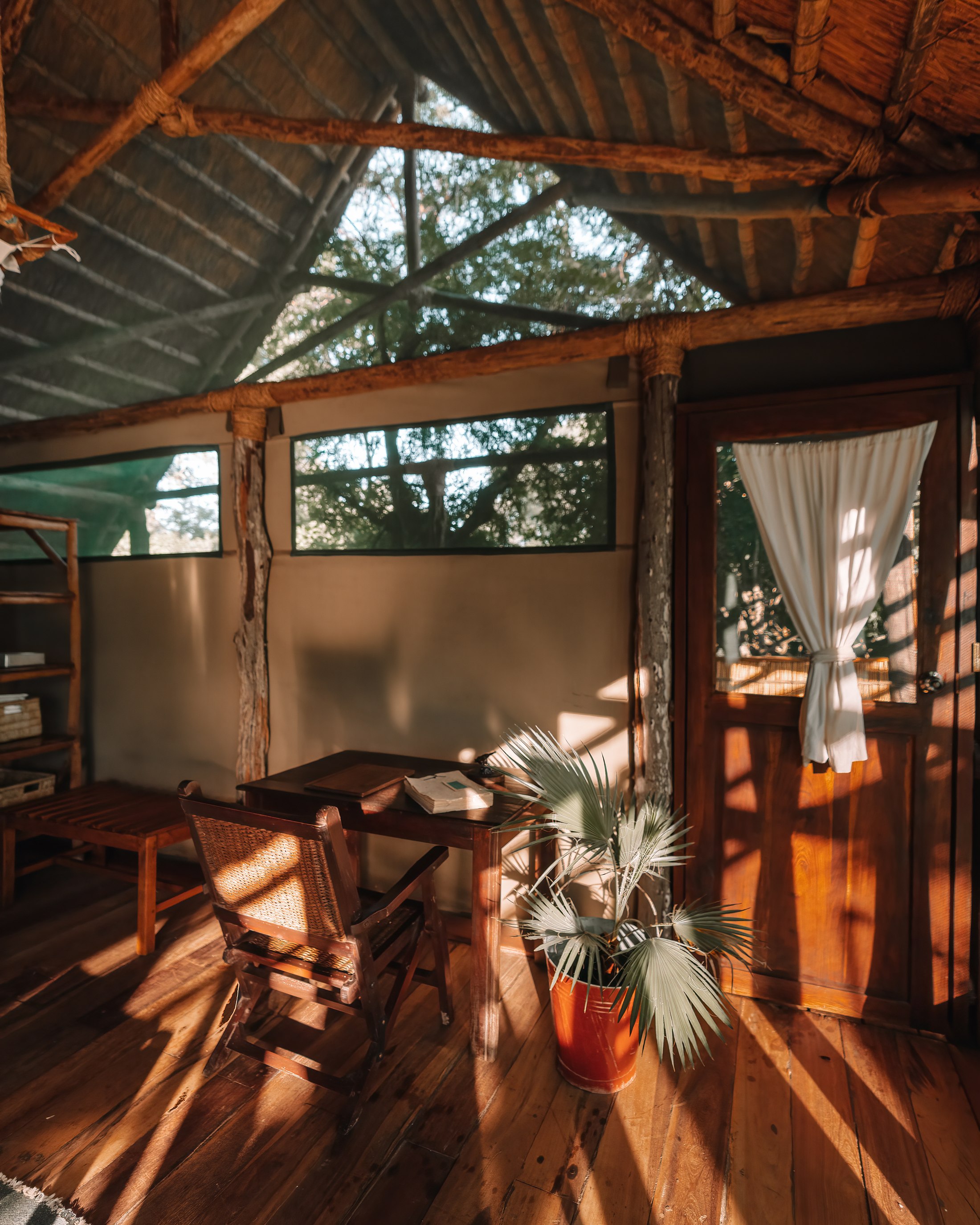 The warm interior of Lagoon Chalet 7 at Mvuu Lodge.