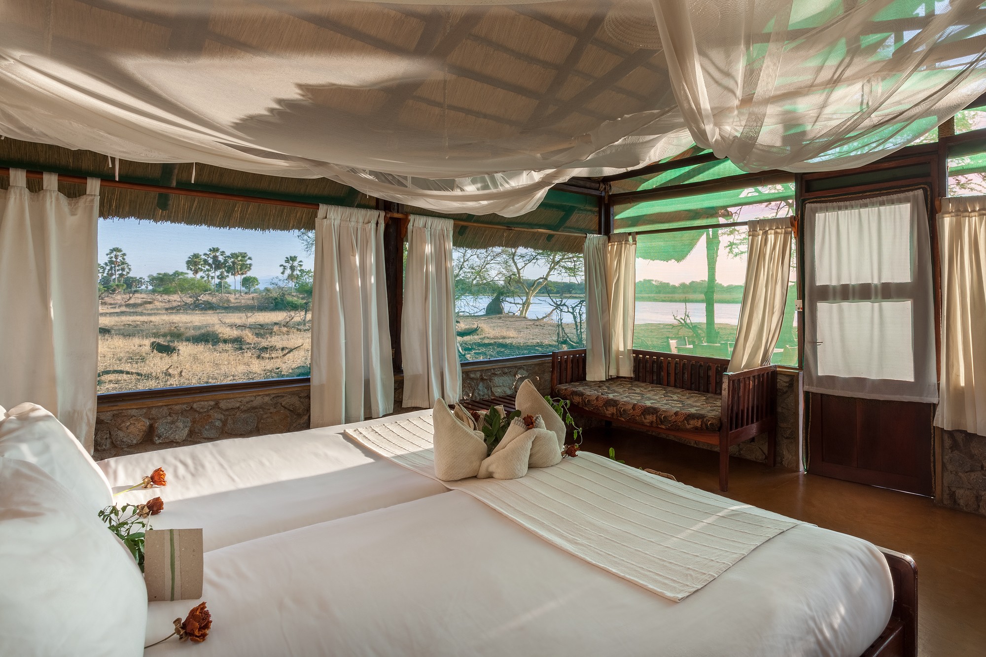 A Mvuu Camp chalet overlooking the river · Mike Dexter.