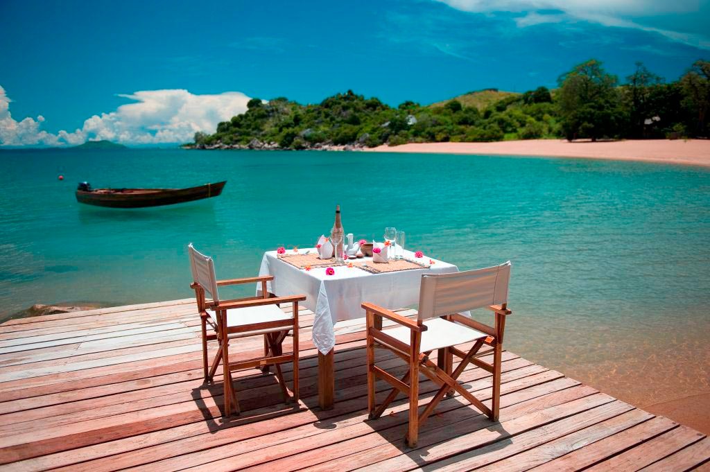 A lakeside lunch setting at Khuyu, Kaya Mawa.