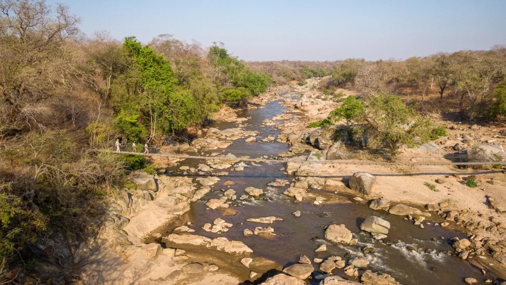 The suspension bridge and river at Mkulumadzi.