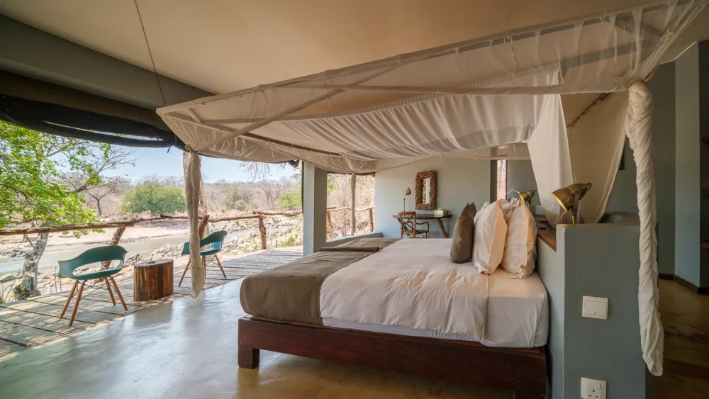 Bedroom opening towards the river at Mkulumadzi.